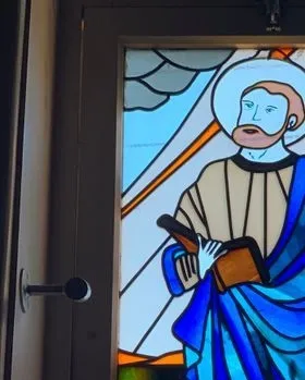 Man Holding a Book — Jamisontown, NSW — Stained Glass Overlay Penrith