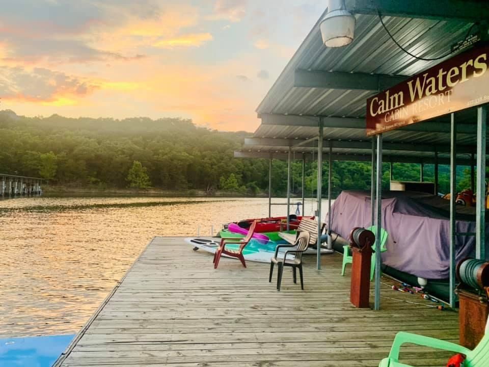 Dock with boats under a covered area, 