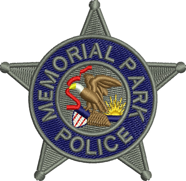 A memorial park police badge with an eagle on it