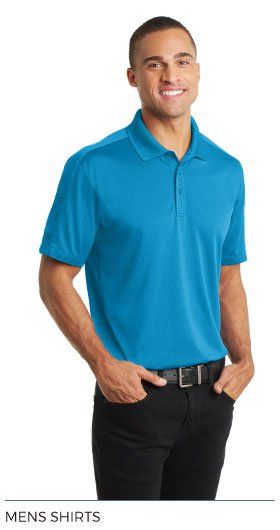 A man wearing a blue polo shirt and black jeans