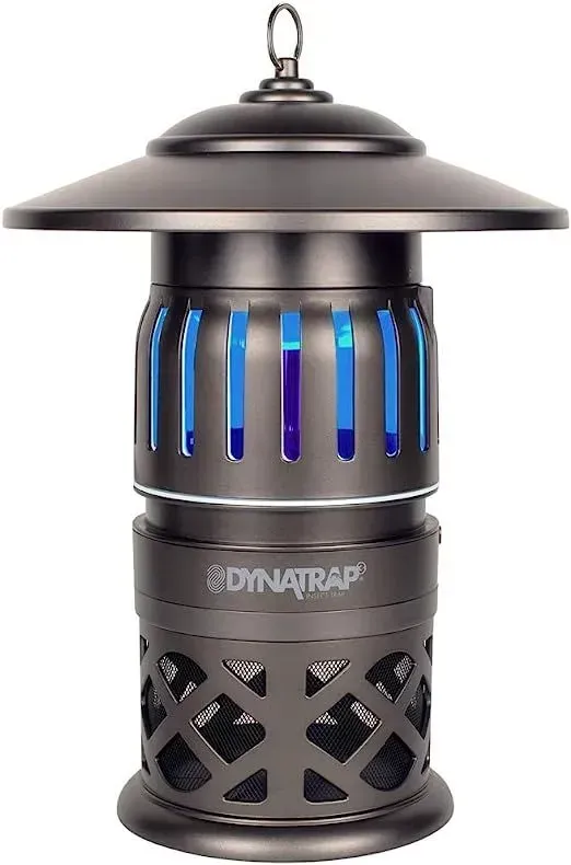 Dark gray Dynatrap mosquito trap with blue UV light and decorative base, hanging from a metal loop.