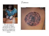 A woman is getting a tattoo on her back.