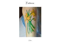 A person has a tattoo of a bunch of yellow flowers on their arm.