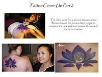 A woman is getting a tattoo of a lotus flower on her back.