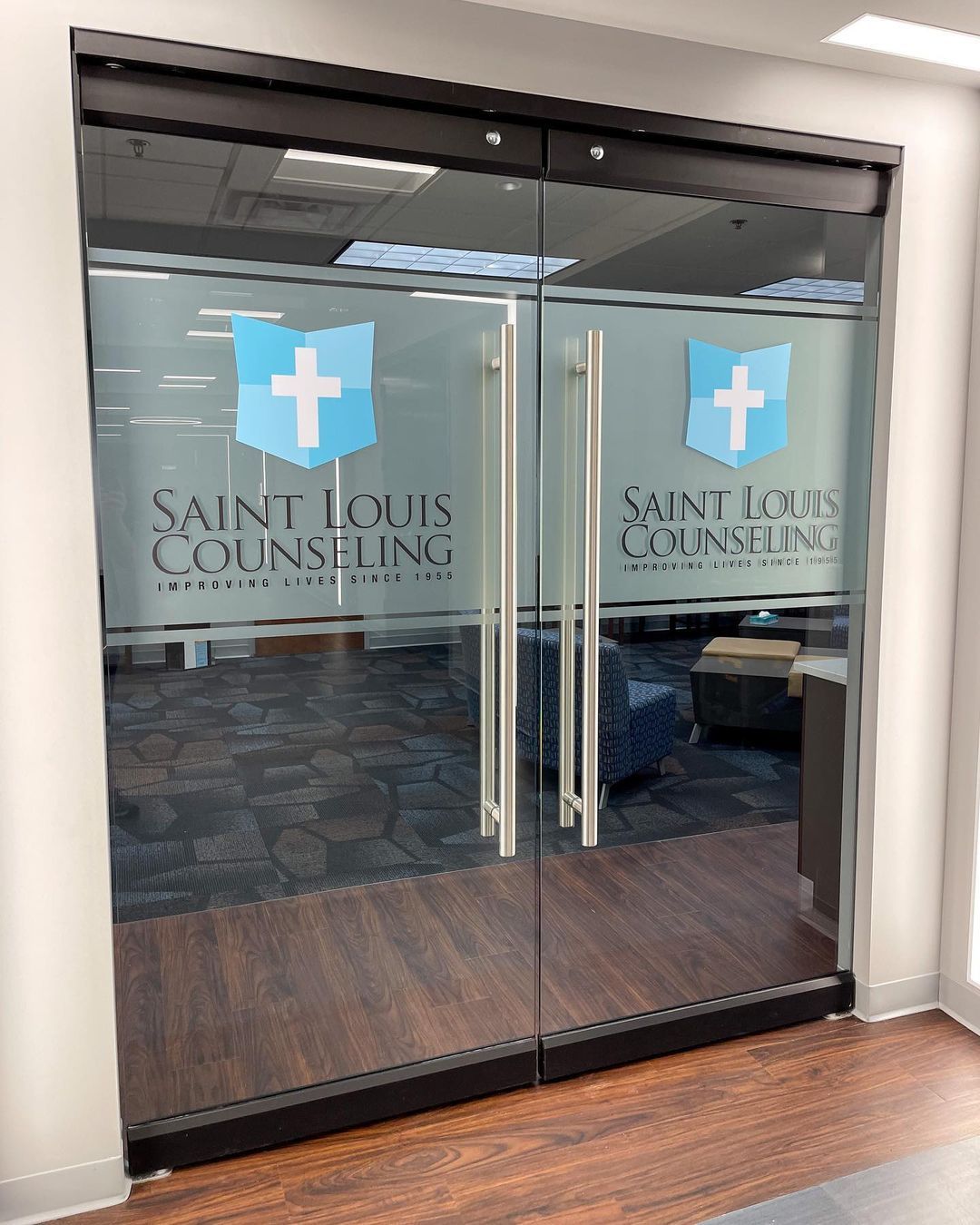Design on twin doors — St. Louis, MO — The Designery Sign Shop