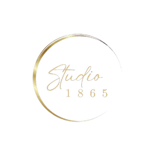 A gold circle with the words studio 1865 written inside of it