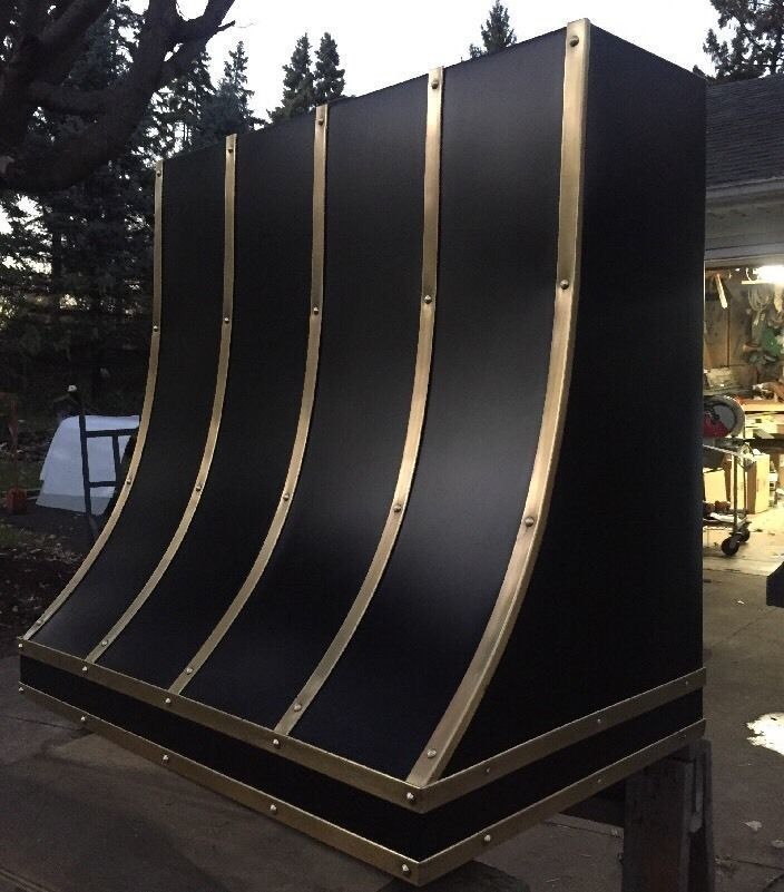 A black and gold item is sitting on a table