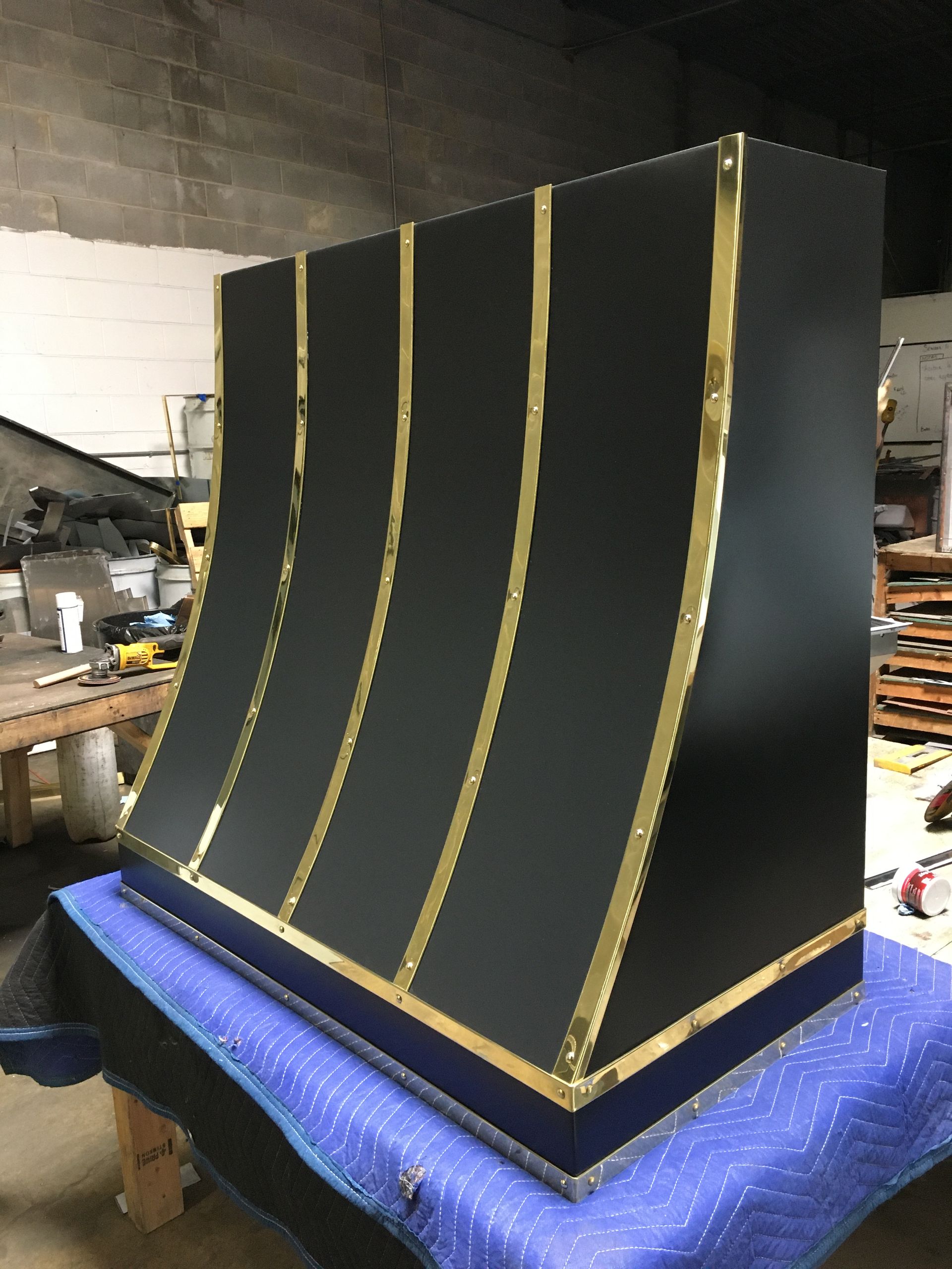 A black and gold item is sitting on a table