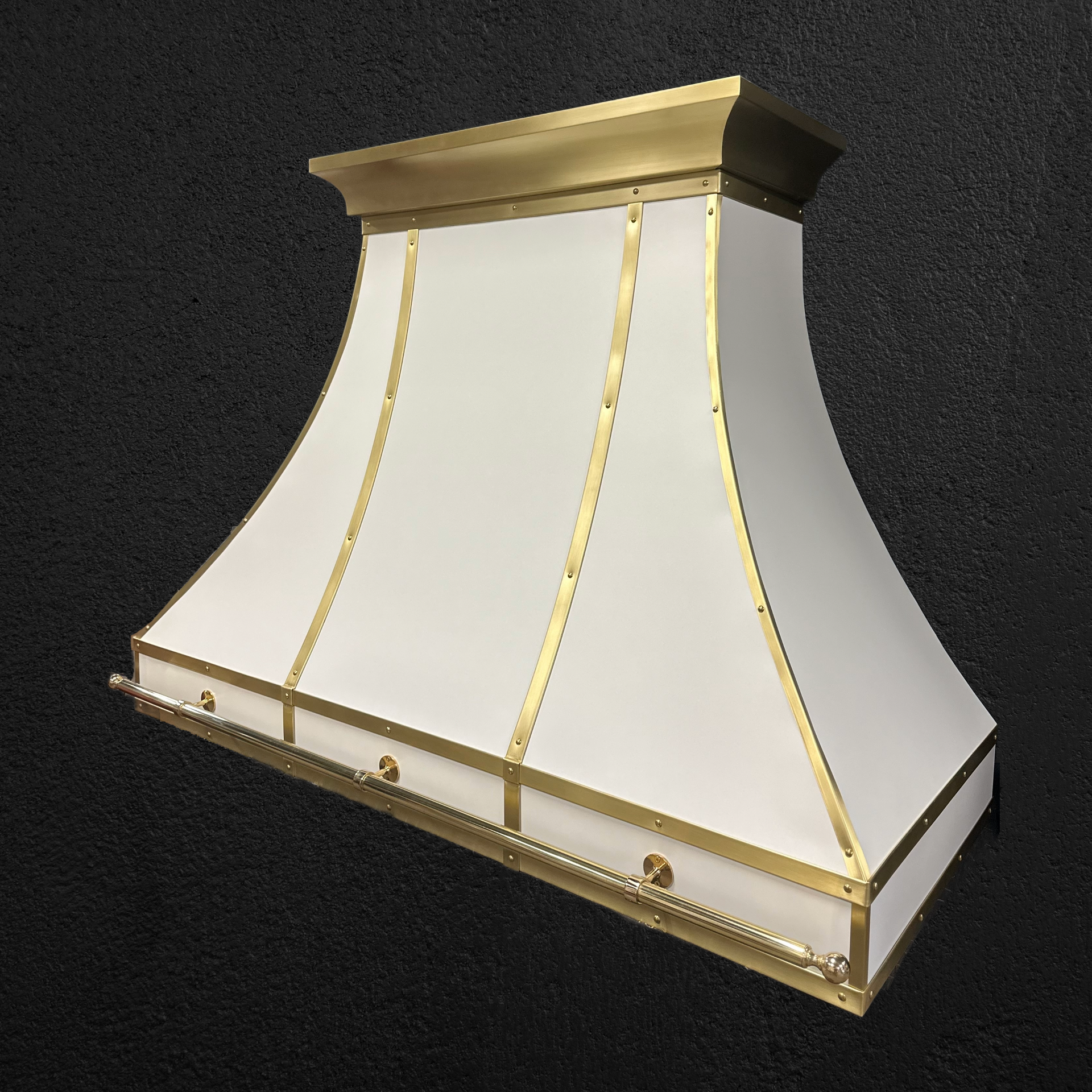 A white and gold hood with a black background