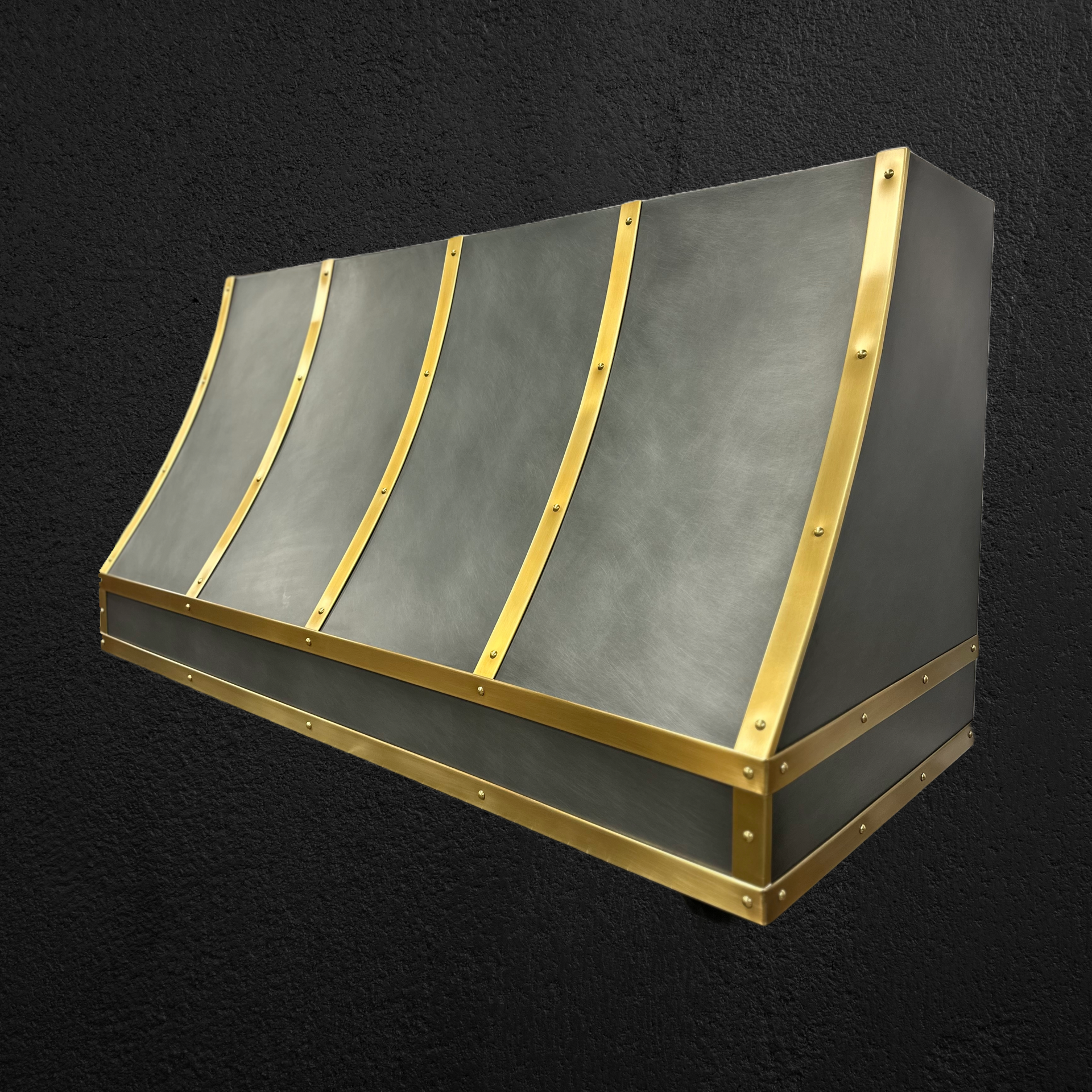 A gray and gold item with a black background
