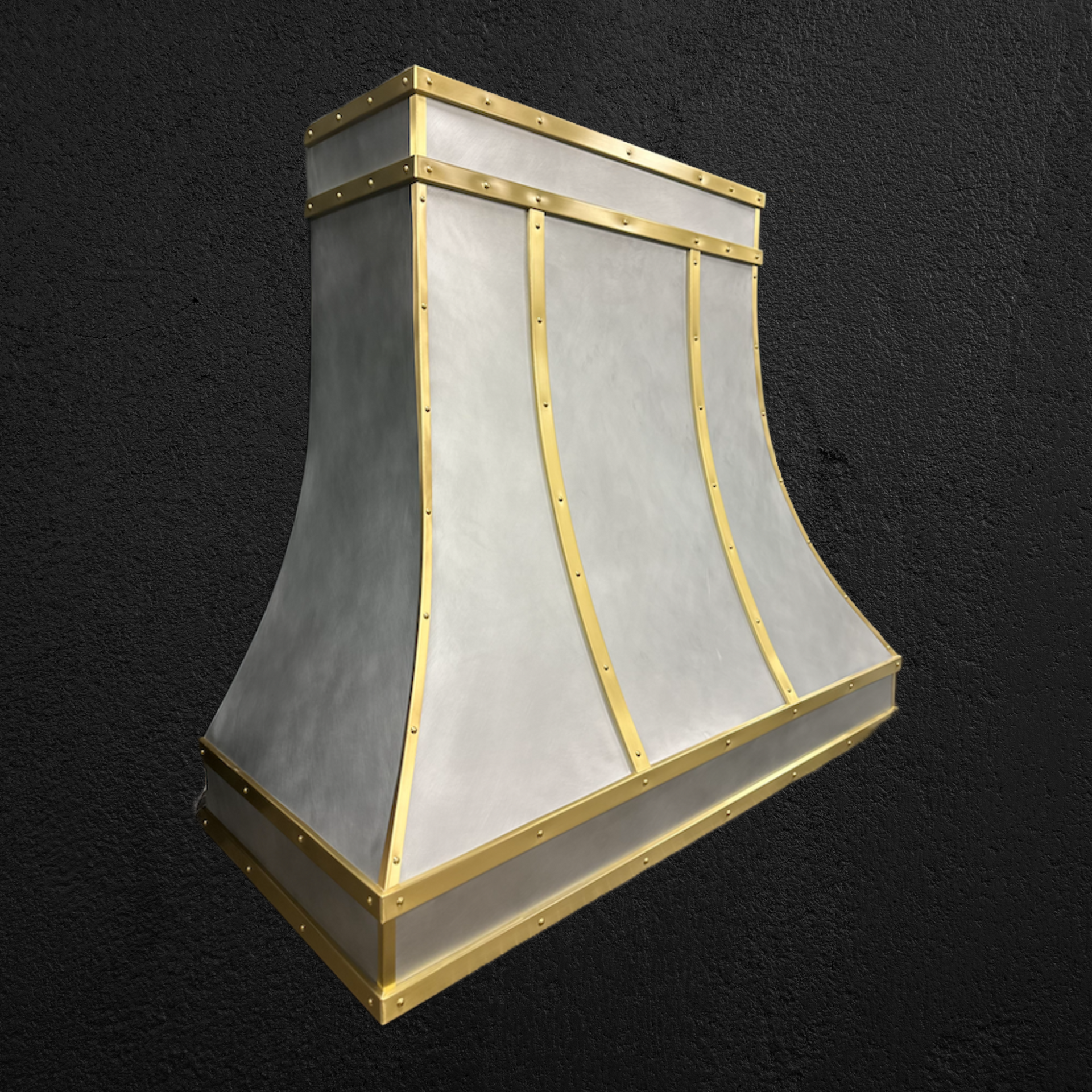 A white hood with gold trim on a black background