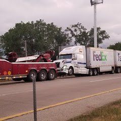 Tractor Trailer - Towing a White Delivery Truck in Hazel Crest, IL