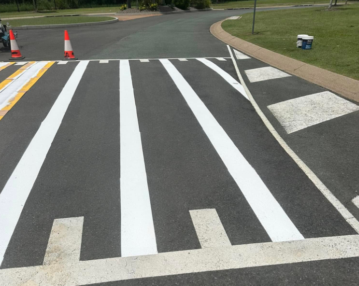 A White Crossing Is Painted On The Road — Wide Bay Line Marking in Maryborough, QLD