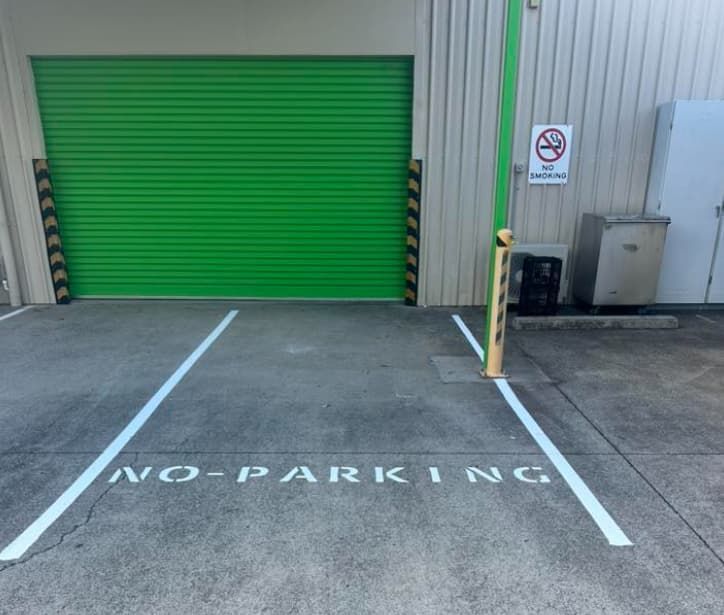 A No Parking Sign Is Painted On The Side Of A Parking Lot — Wide Bay Line Marking in Wondunna, QLD