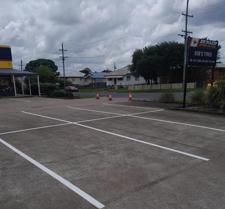 A Parking Lot With Line Markings — Wide Bay Line Marking in Wondunna, QLD