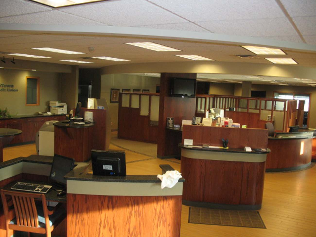 A large office with lots of desks and chairs