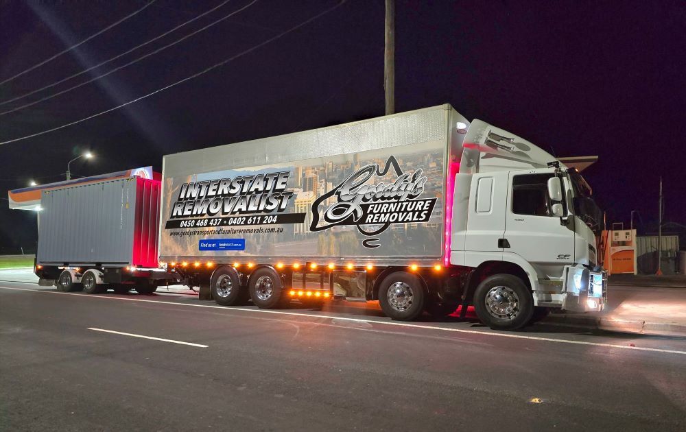 Large Removal Truck parked on side of the road at night — Gordy's Furniture Removals in Bathurst, NSW