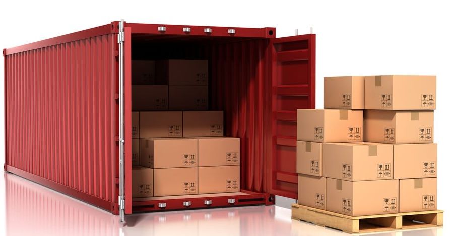 Red Container With Packing Boxes Stacked Inside — Gordy's Furniture Removals in Bathurst, NSW