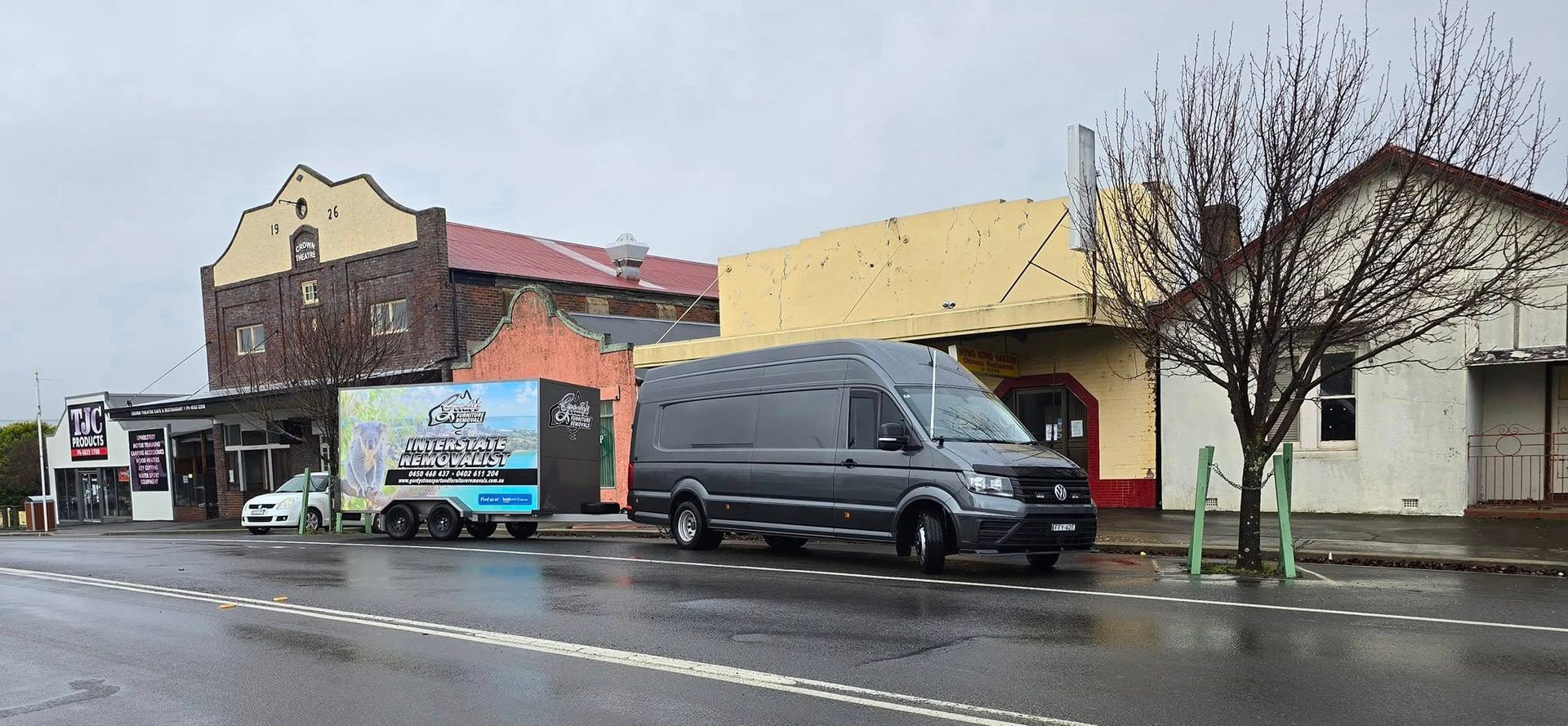 A van is parked on the side of the road in front of a building — Gordy's Furniture Removals in Bathurst, NSW
