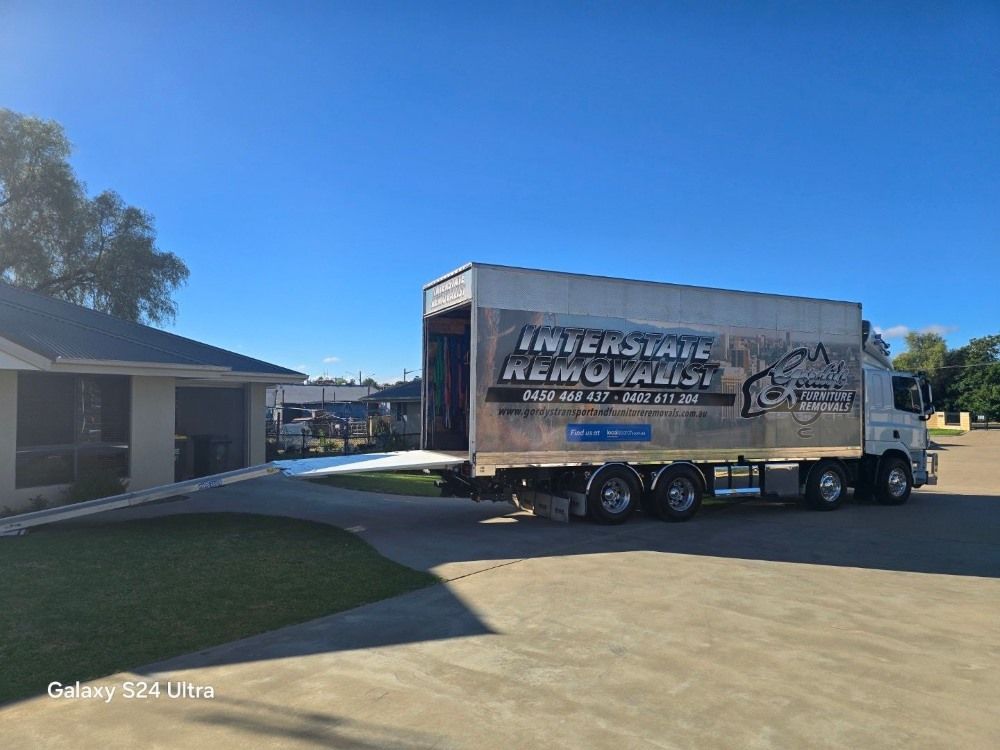 Truck With the Back Open Ready to Start Loading — Gordy's Furniture Removals in Bathurst, NSW