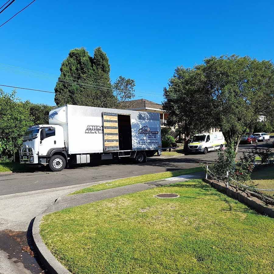A Moving Truck Is Parked On The Side Of The Road — Gordy's Furniture Removals in Bathurst, NSW