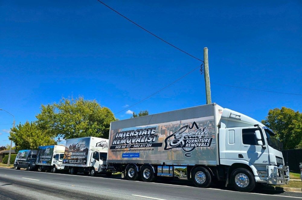 A Daf Truck Is Parked On The Side Of The Road — Gordy's Furniture Removals in Bathurst, NSW
