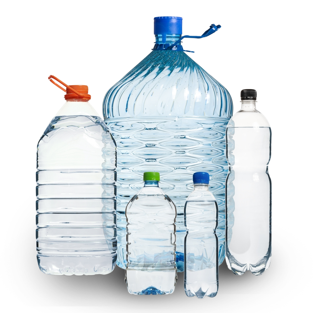 Several clear plastic water bottles of varying sizes.