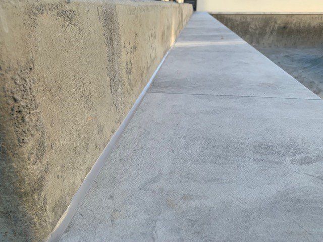 Gray Sealant Applied On The Side Of Concrete — South East, QLD — Seamless Silicone