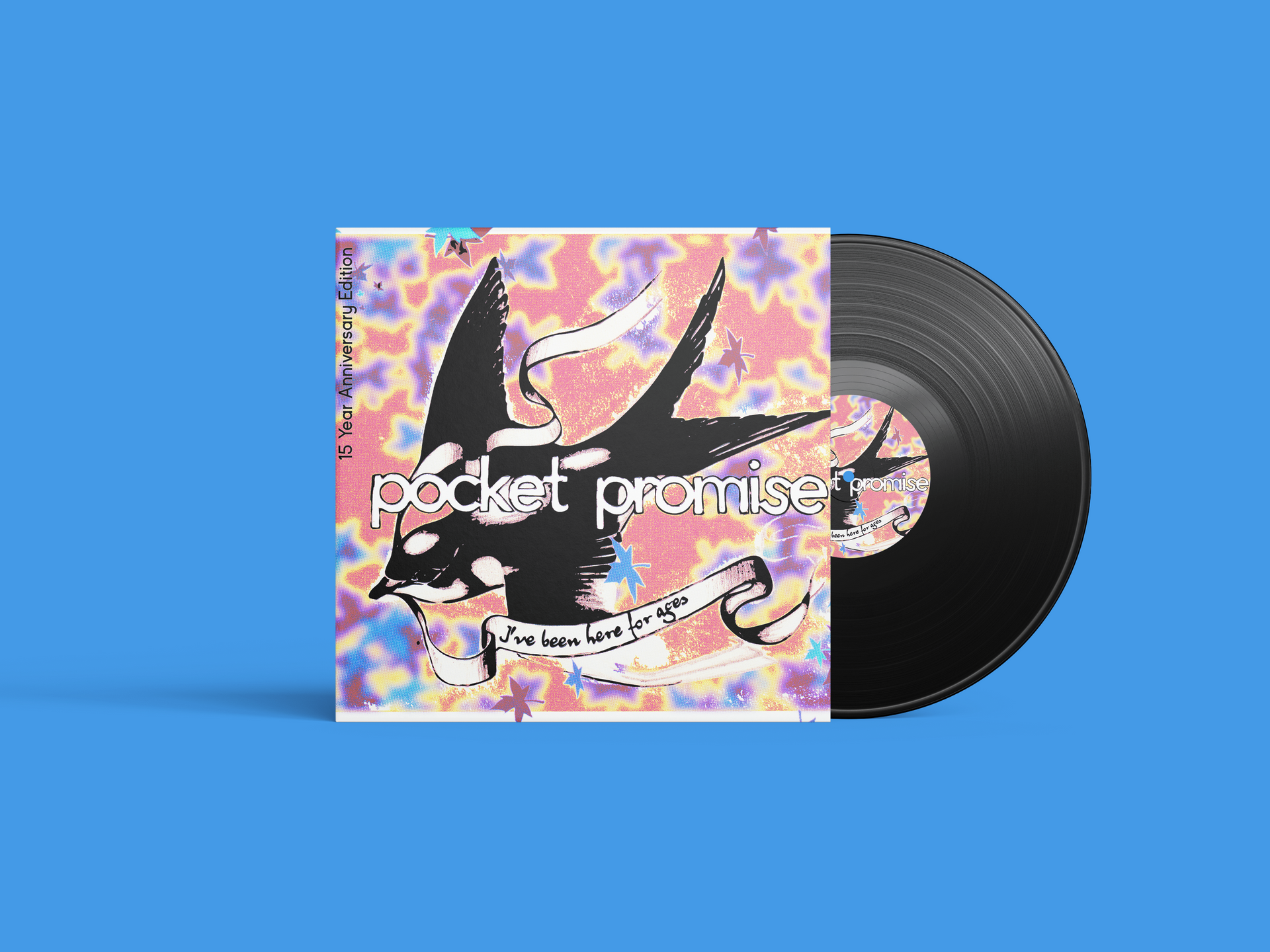 Vinyl record with album art featuring a black bird silhouette,