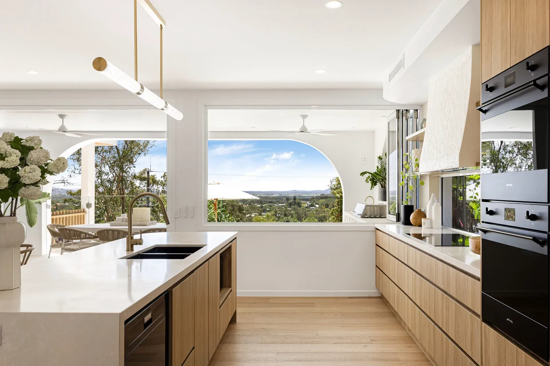 Modern Kitchen With Light Wood Cabinets — Foreshore Kitchens in Coolum Beach, QLD