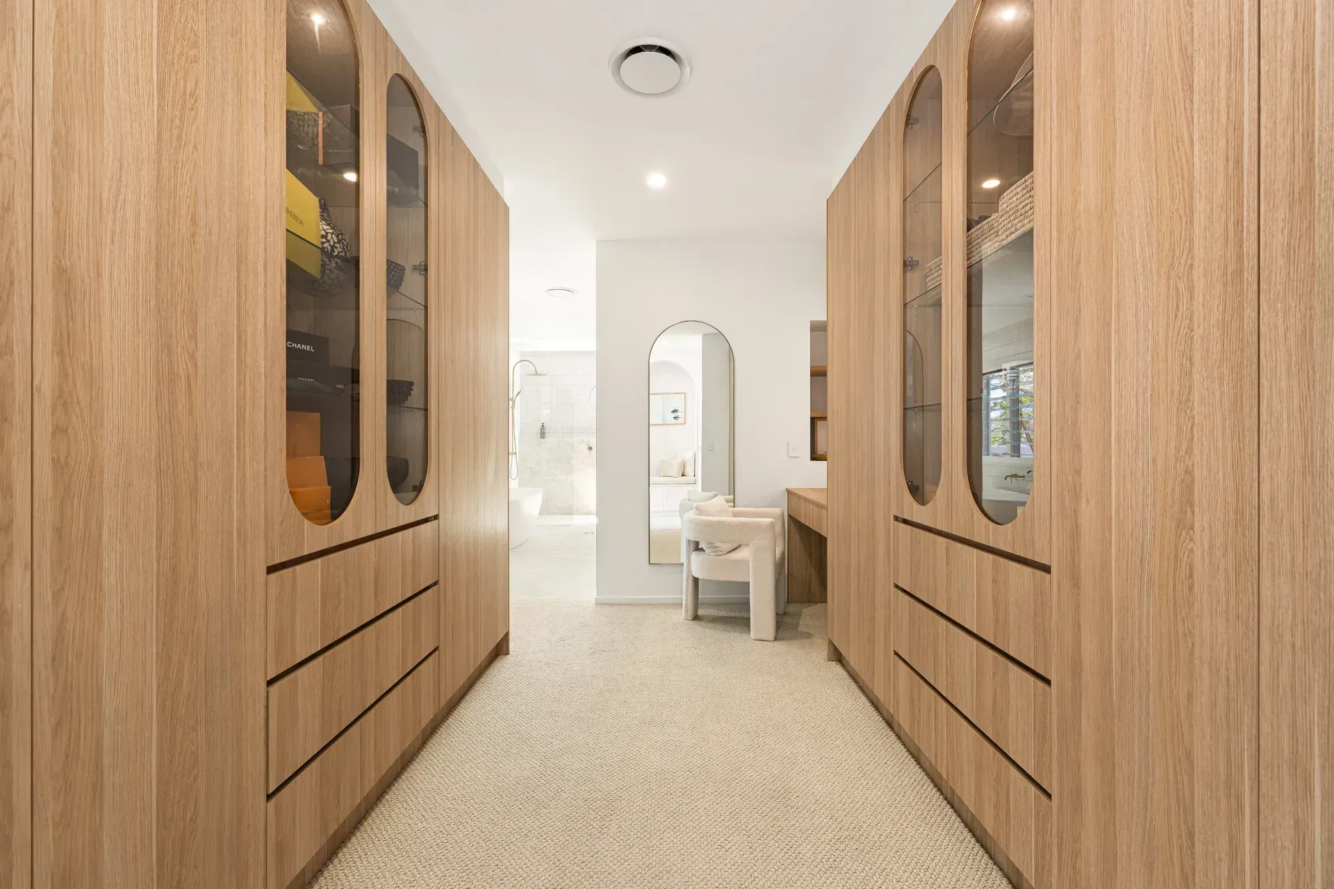 Walk-in Wardrobe With Light Wood Cabinetry — Foreshore Kitchens in Coolum Beach, QLD