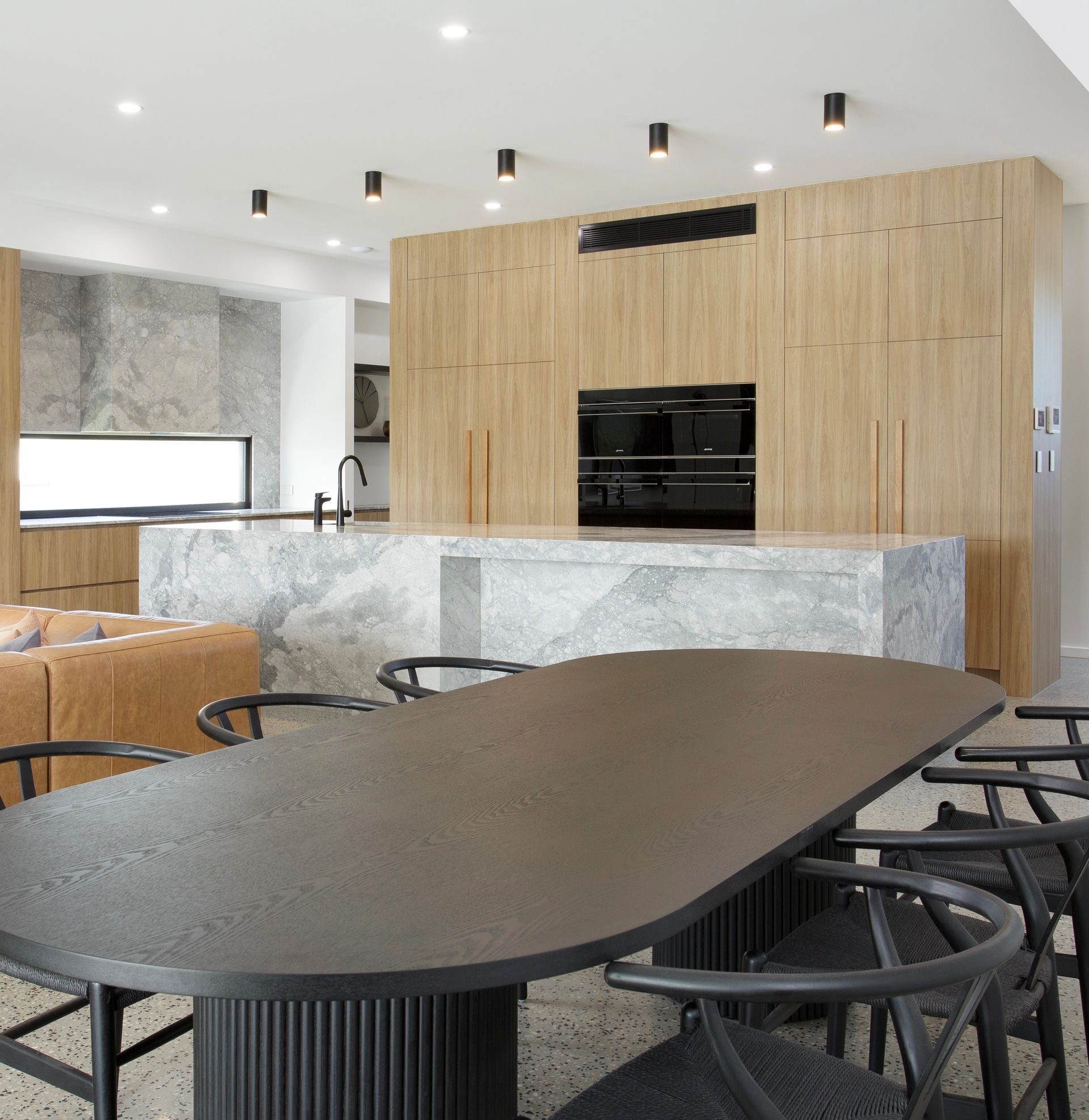 Modern Kitchen With Dark Cabinetry — Foreshore Kitchens in Coolum Beach, QLD
