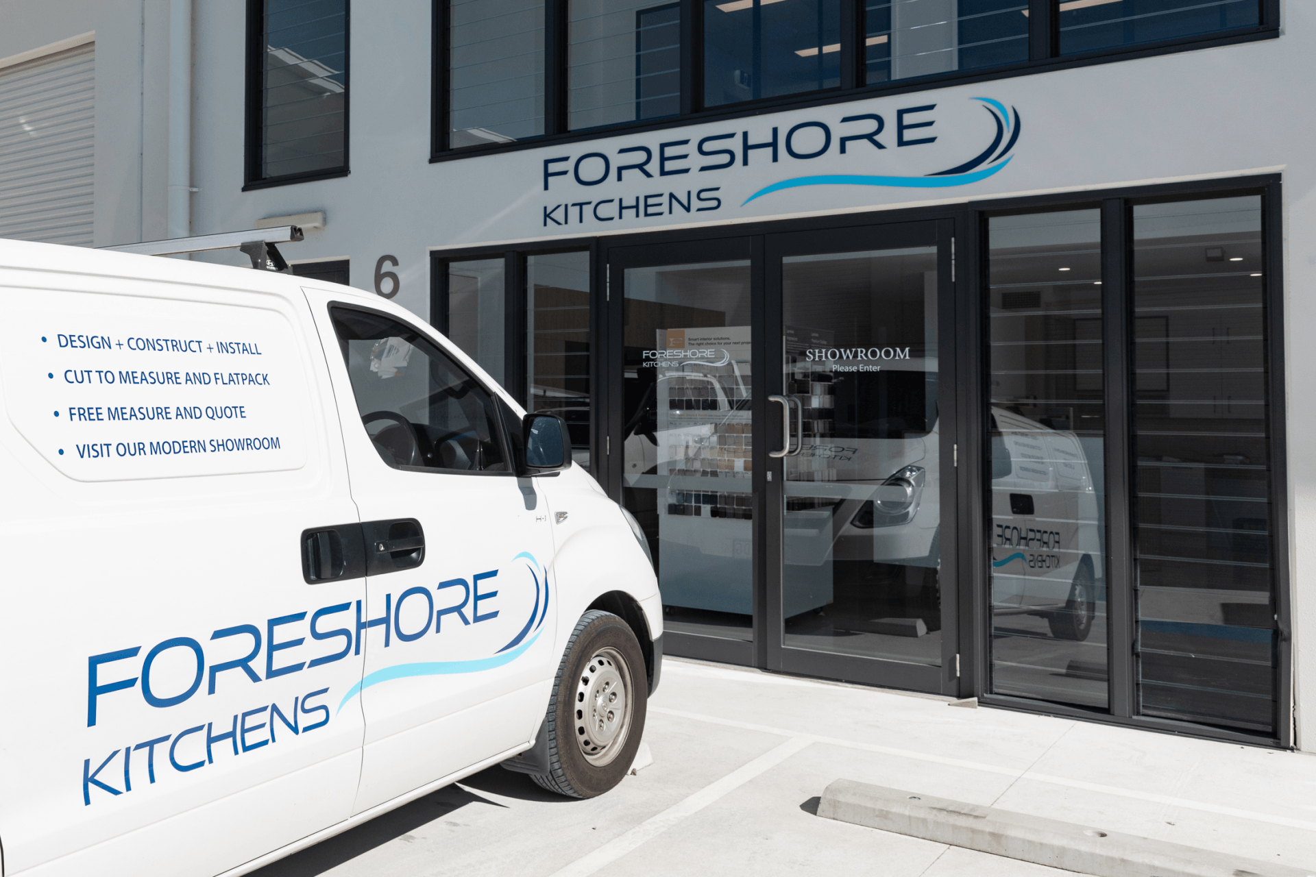 White Van Parked Outside Foreshore Kitchens Storefront — Foreshore Kitchens in Coolum Beach, QLD