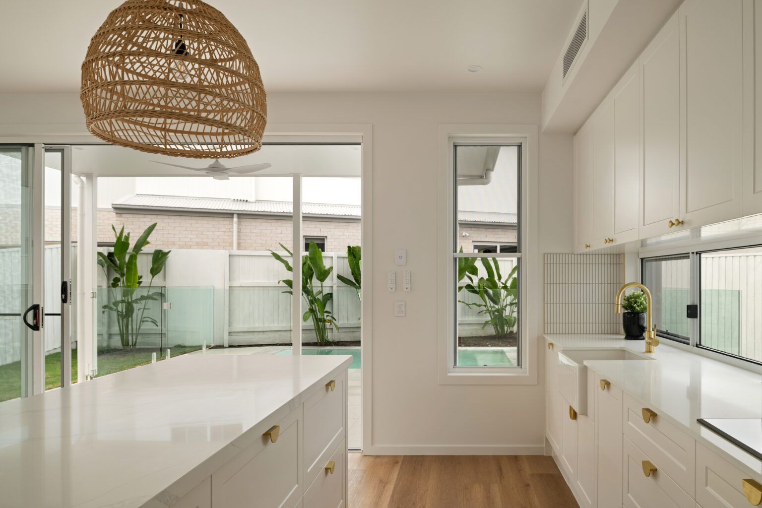 Modern White Kitchen With a Large Island — Foreshore Kitchens in Coolum Beach, QLD