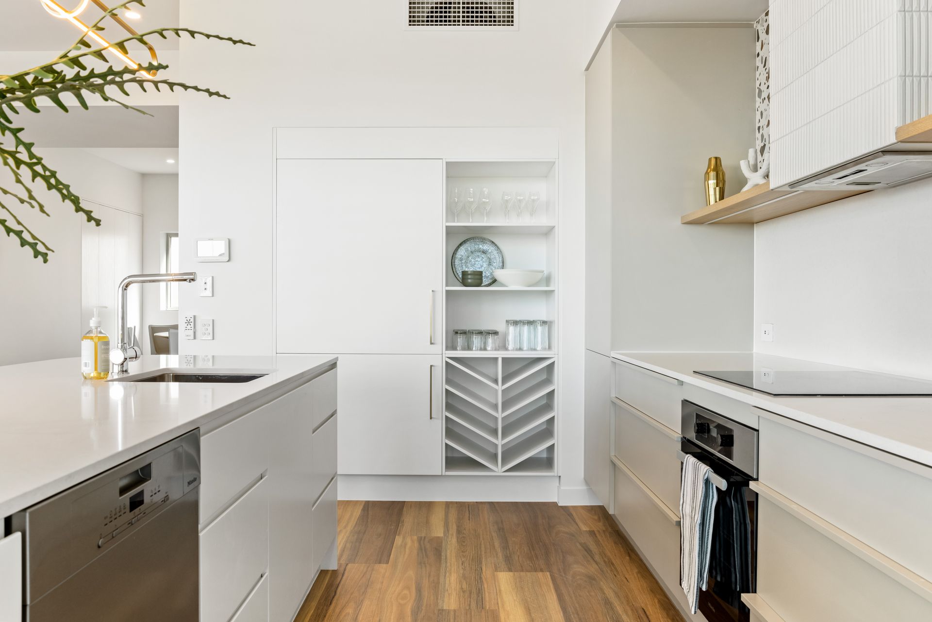 A Modern Kitchen With White Cabinetry — Foreshore Kitchens in Maroochydore, QLD