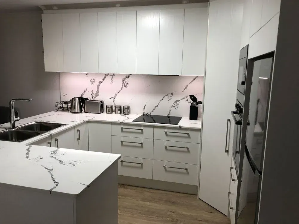Modern White Kitchen With Marble-look Countertops — Foreshore Kitchens in Coolum Beach, QLD