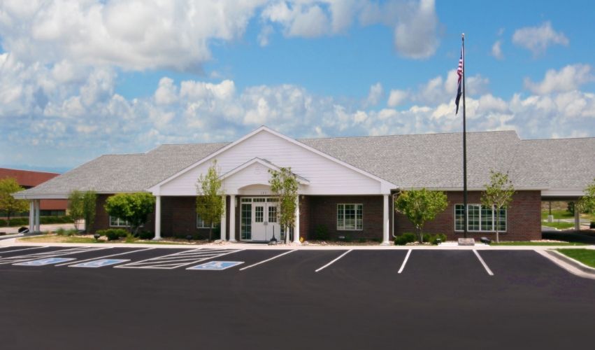 A building with a flag in front of it