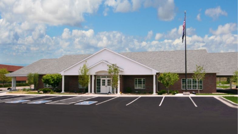 A building with a flag in front of it