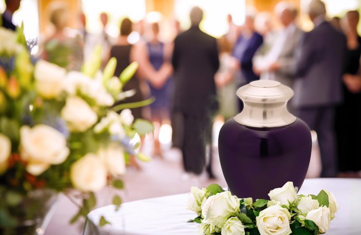memorial gathering with cremation urn