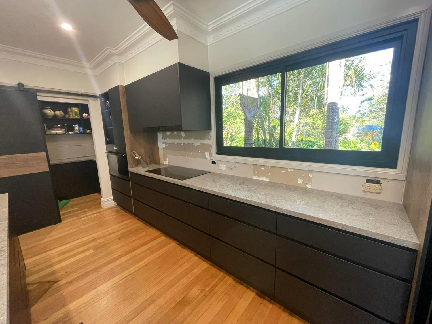 A Modern Kitchen Renovation with Cabinets — Envy Glass in Macksville, NSW