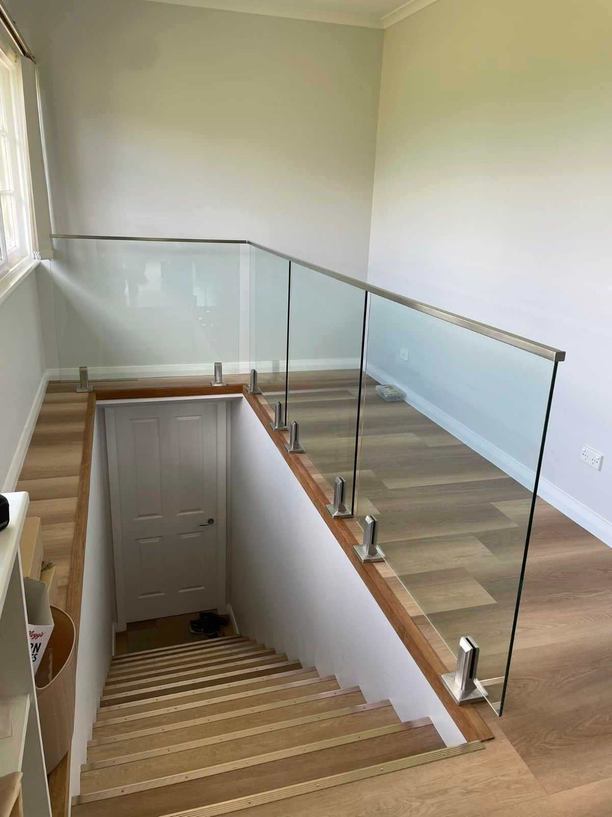 A Staircase with Glass Railing — Envy Glass in Urunga, NSW