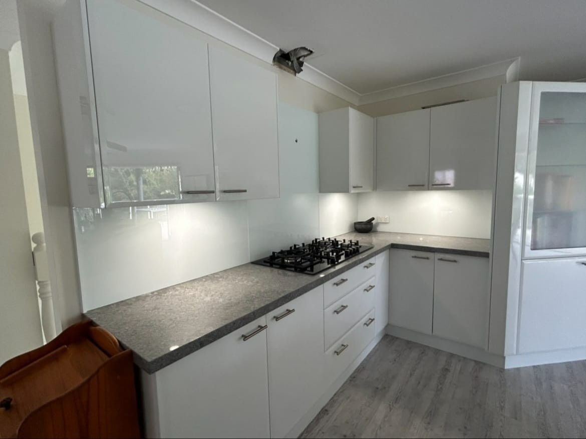 A Kitchen with Grey Countertops and Cabinets — Envy Glass in Coffs Harbour, NSW