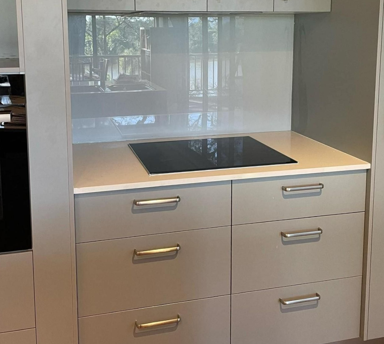 White Kitchen with Wood Counters, Cabinets, and Floors — Envy Glass in Nambucca Heads, NSW