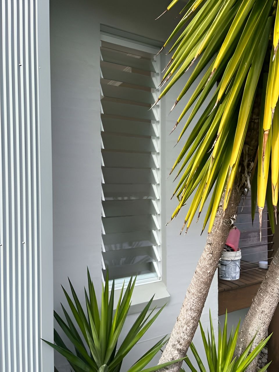 White Louvered Window Set in A White Wall — Envy Glass in Nambucca Heads, NSW