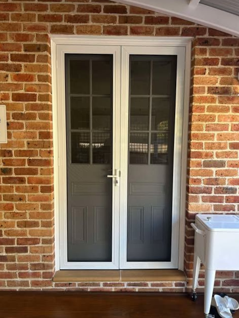 White-Framed Double Doors with Screen Panels on A Brick Wall Porch — Envy Glass in Nambucca Heads, NSW