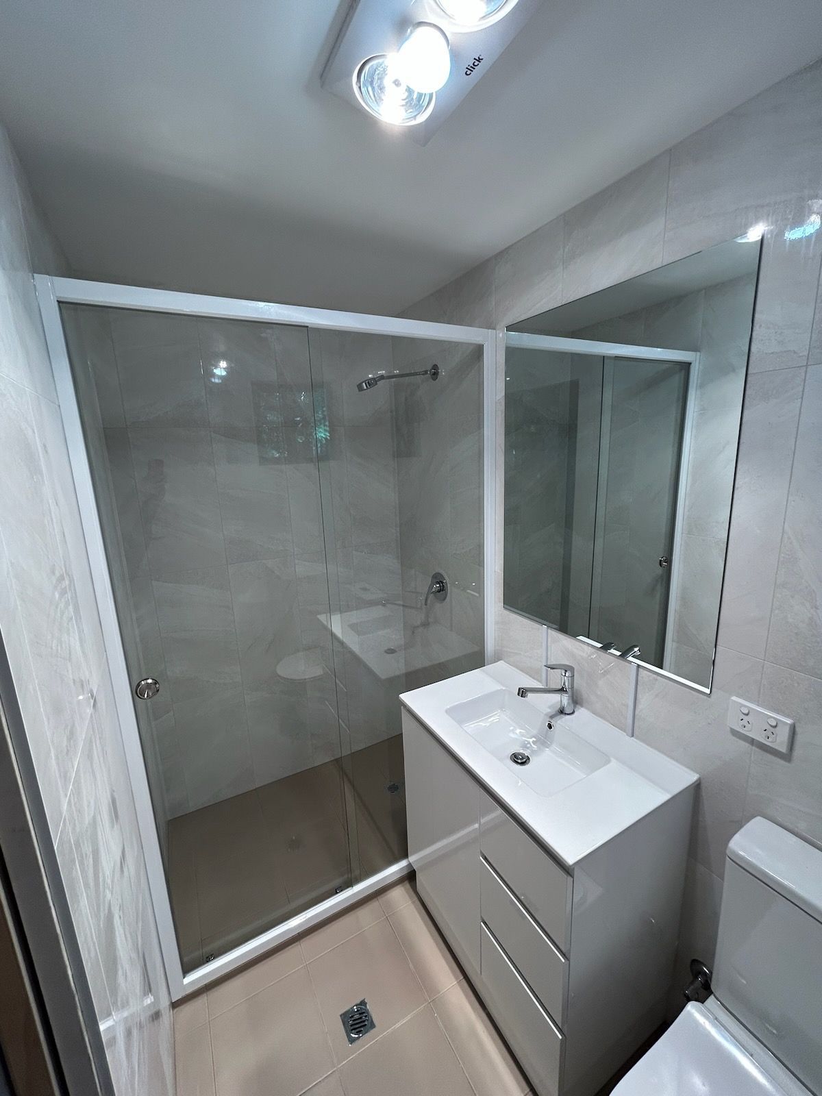 Modern Bathroom with Shower and Framed Mirror — Envy Glass in Nambucca Heads, NSW