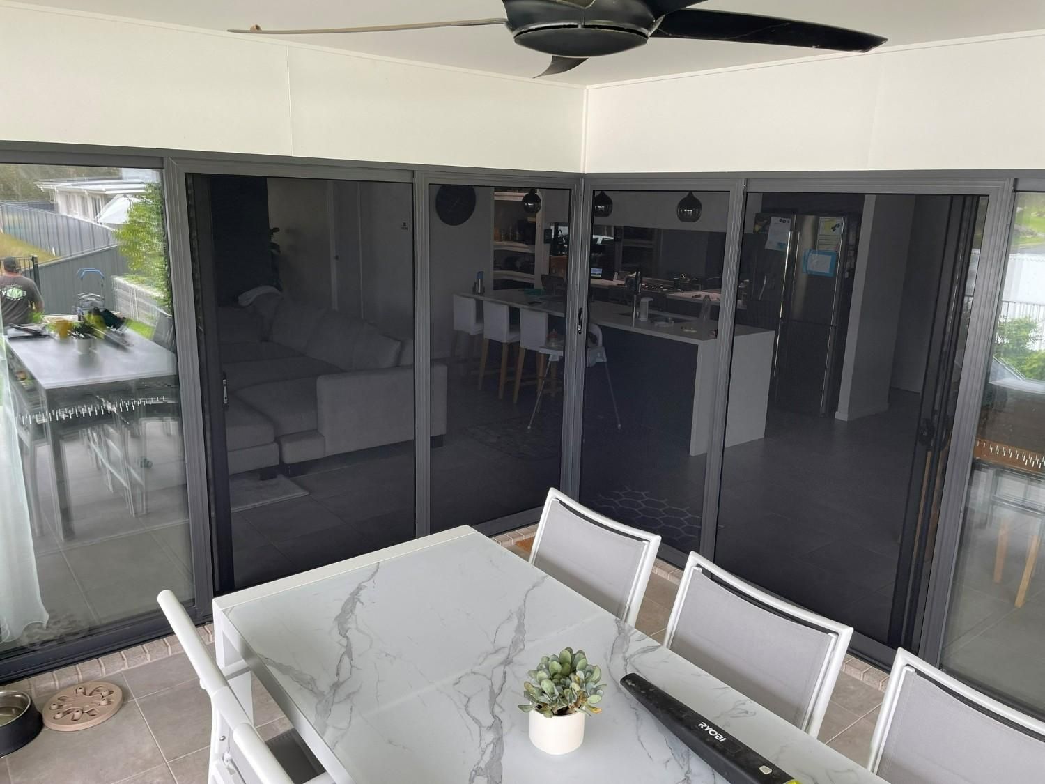 A Patio with Dining Table — Envy Glass in Nambucca Heads, NSW