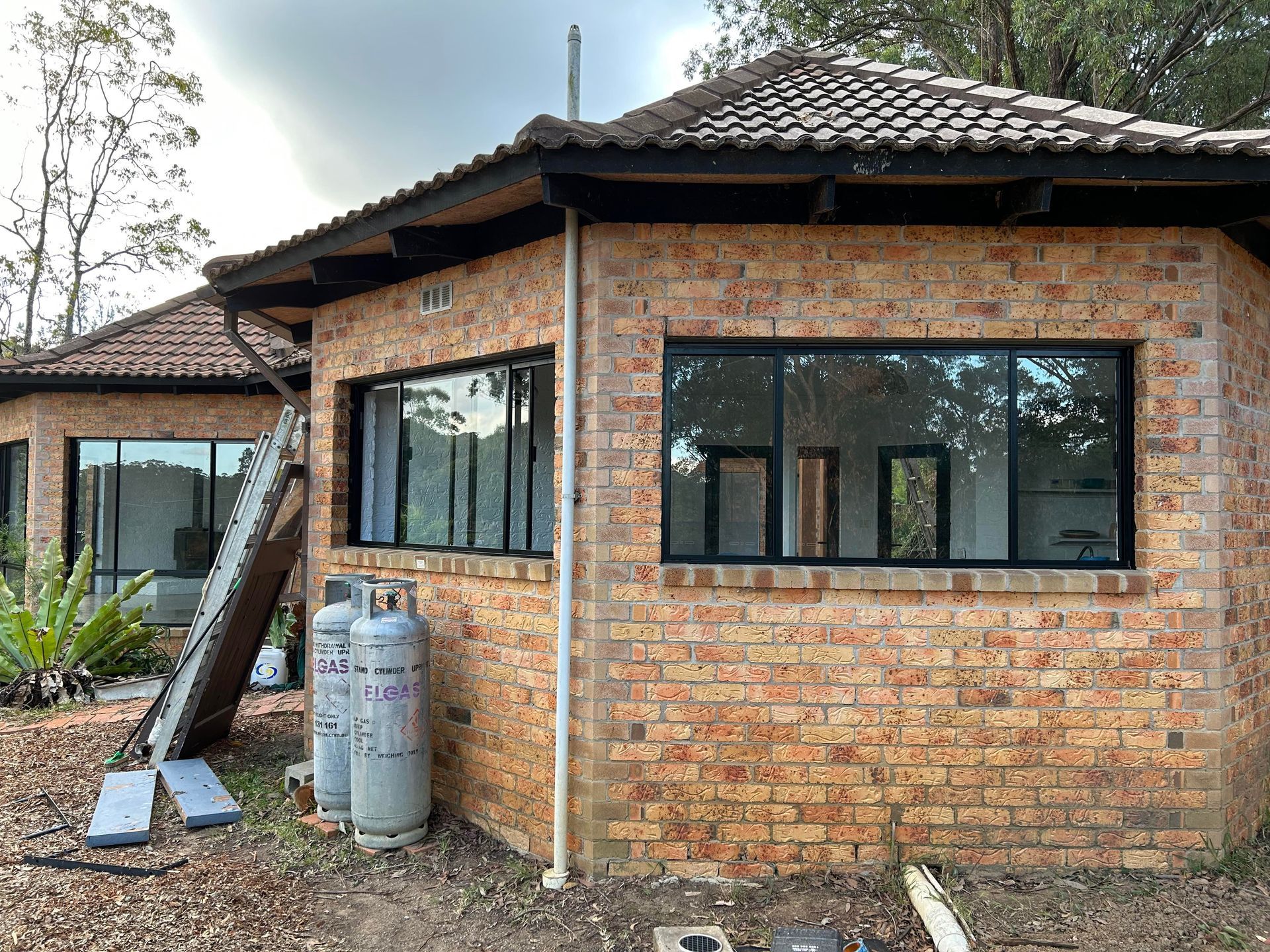 Brick Building with Black-Framed Windows — Envy Glass in Nambucca Heads, NSW