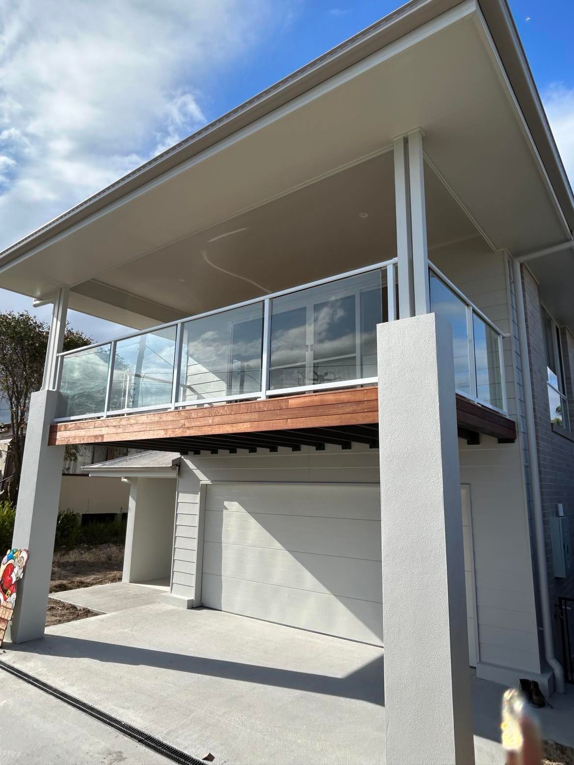 Modern House with A Balcony Featuring Glass Railings — Envy Glass in Nambucca Heads, NSW