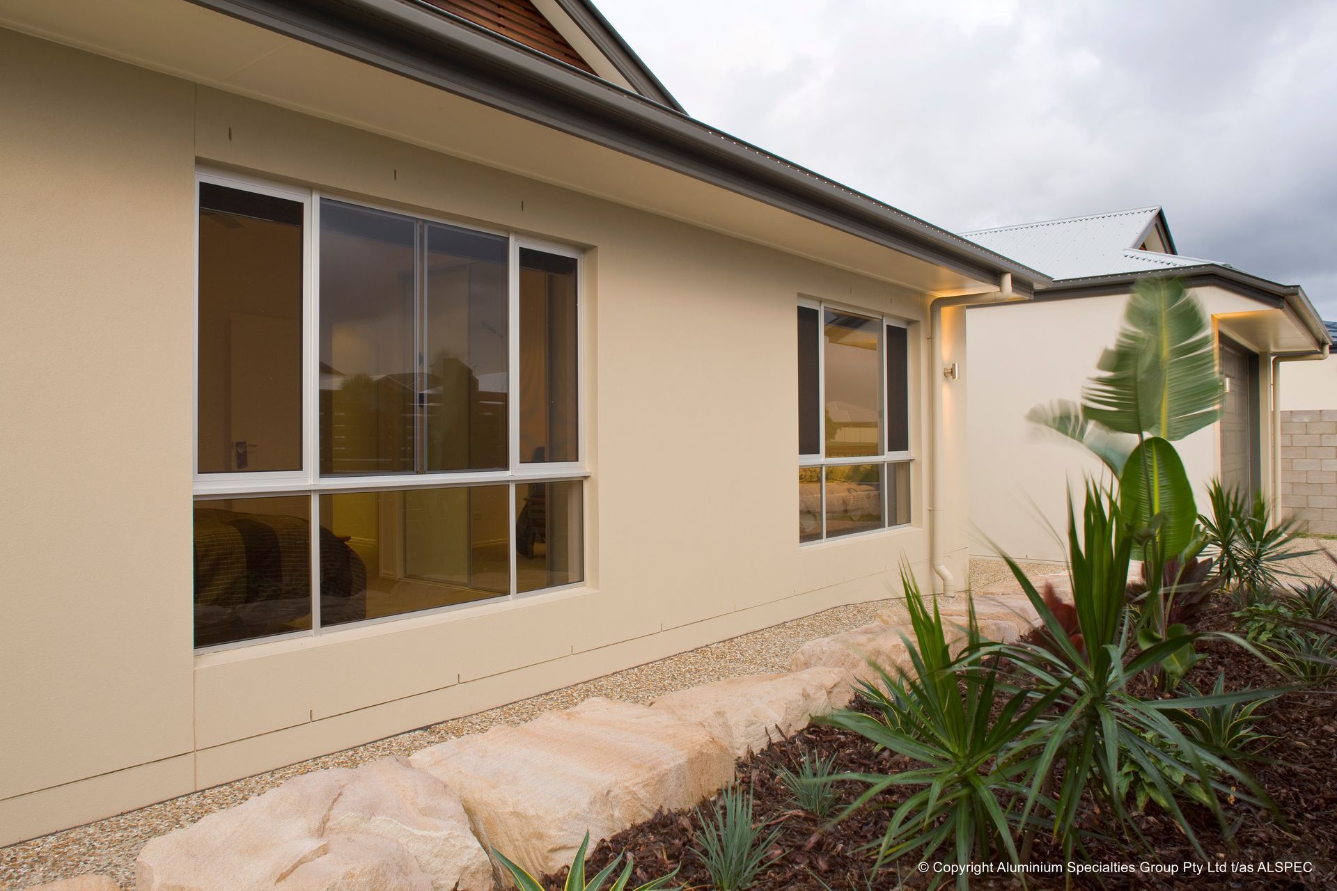 Beige house exterior with windows — Envy Glass in Nambucca Heads, NSW